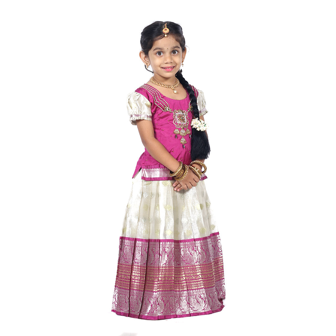 Traditional Royal Purple Pattuvadai set paired with a beautiful pleated skirt