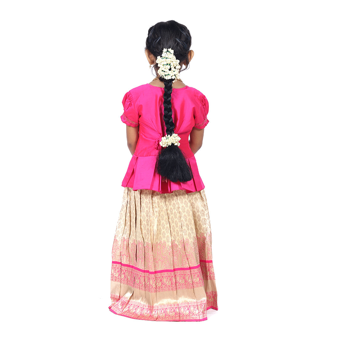 Pink color hand embroidered Pattupavadai set paired with sandal color skirt