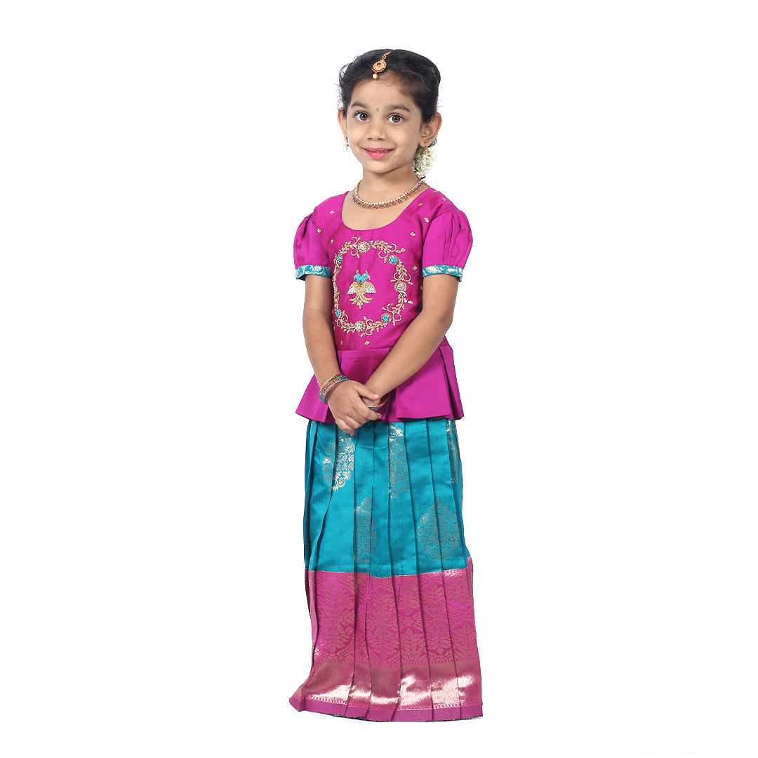 South Indian Traditional Magenta Pink Pattupavadai set with dark turquoise blue skirt