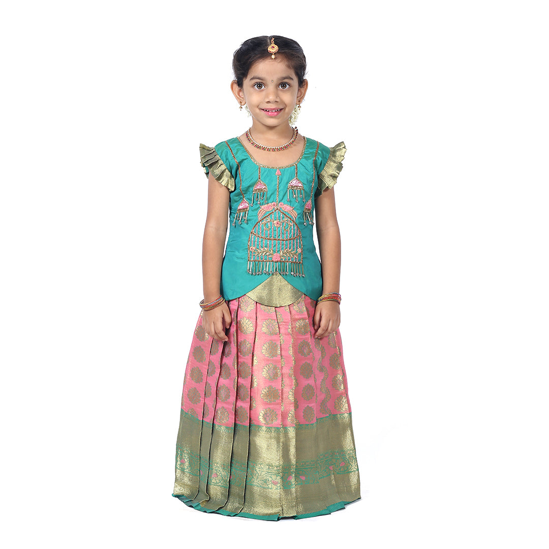 Green Pattupavadai set with pastel pink pleated skirt with Cutshanas and embroidery