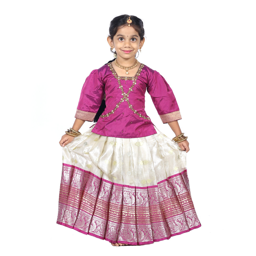 Traditional Royal Purple Pattuvadai set paired with a beautiful pleated skirt