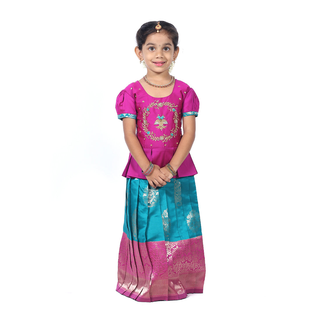 South Indian Traditional Magenta Pink Pattupavadai set with dark turquoise blue skirt