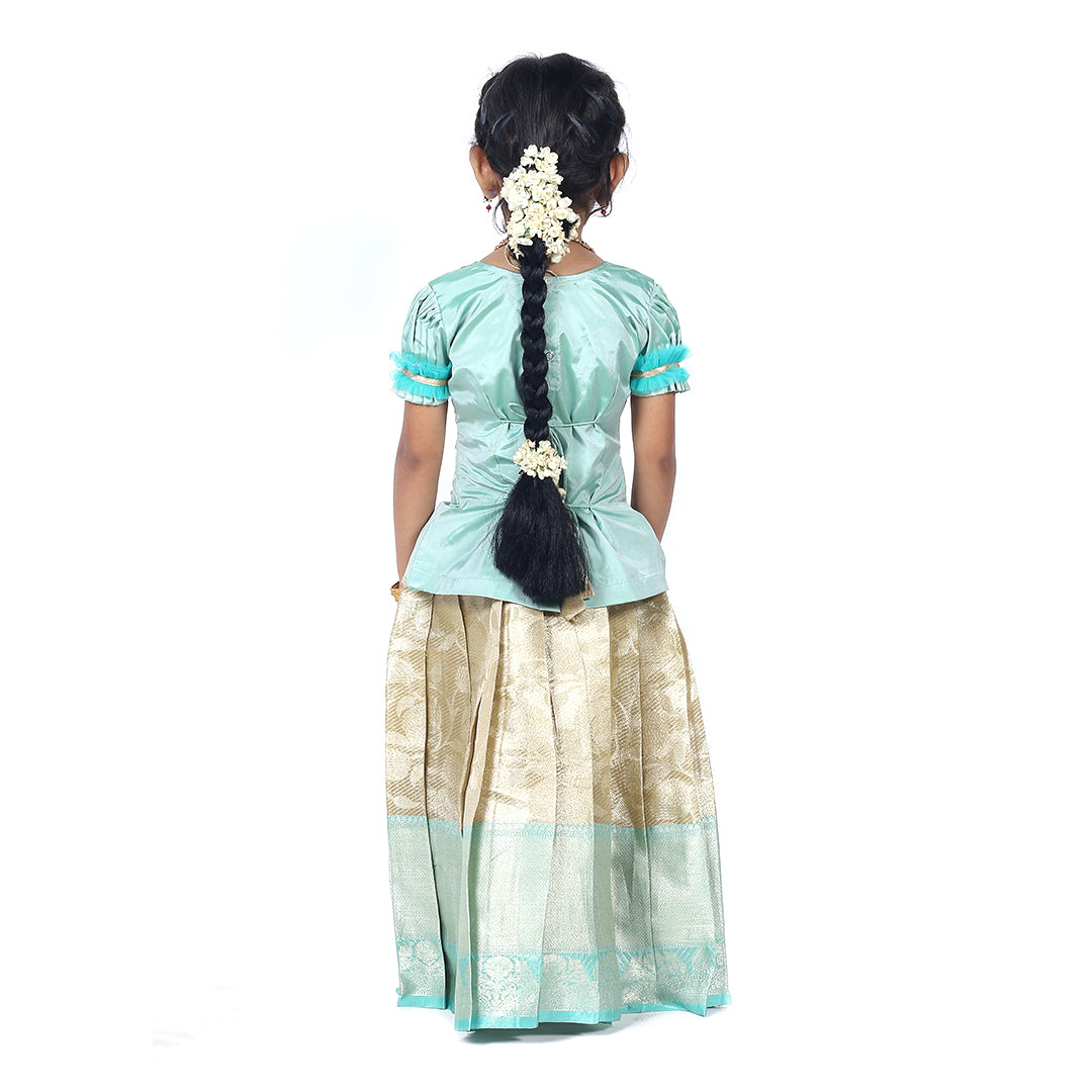 Pastel Green Pattuvadai set paired with multi color embroidery sandal skirt details