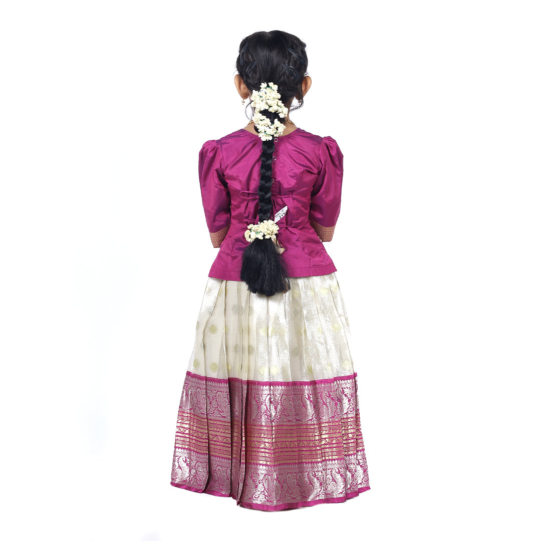 Traditional Royal Purple Pattuvadai set paired with a beautiful pleated skirt