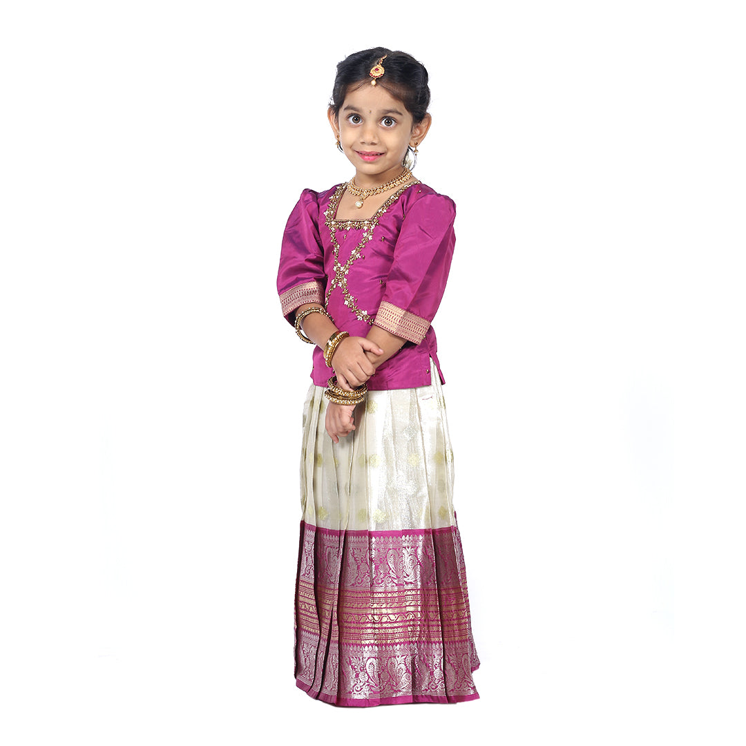 Traditional Royal Purple Pattuvadai set paired with a beautiful pleated skirt