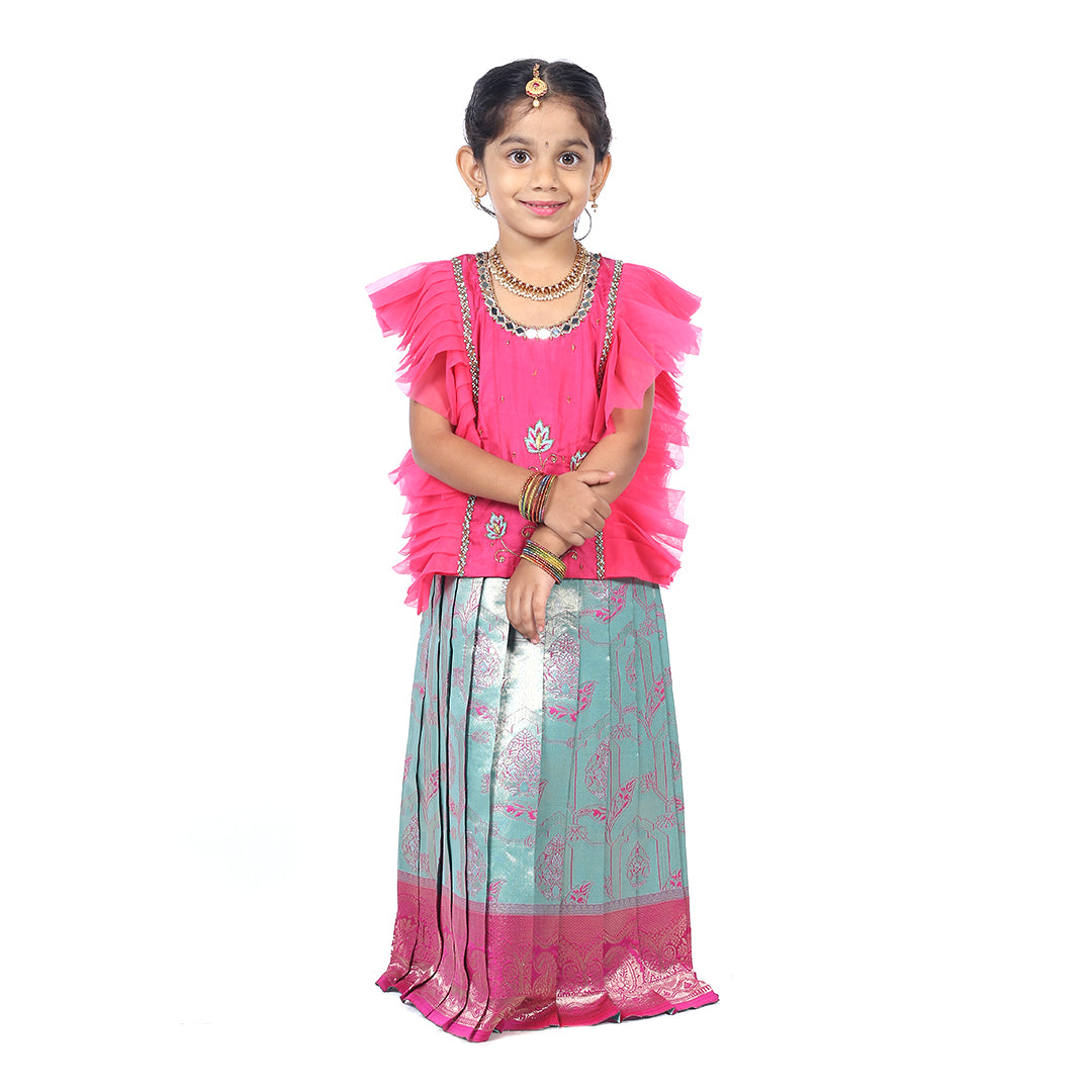 Pink Pattuvadai set paired with multi color embroidery skirt details