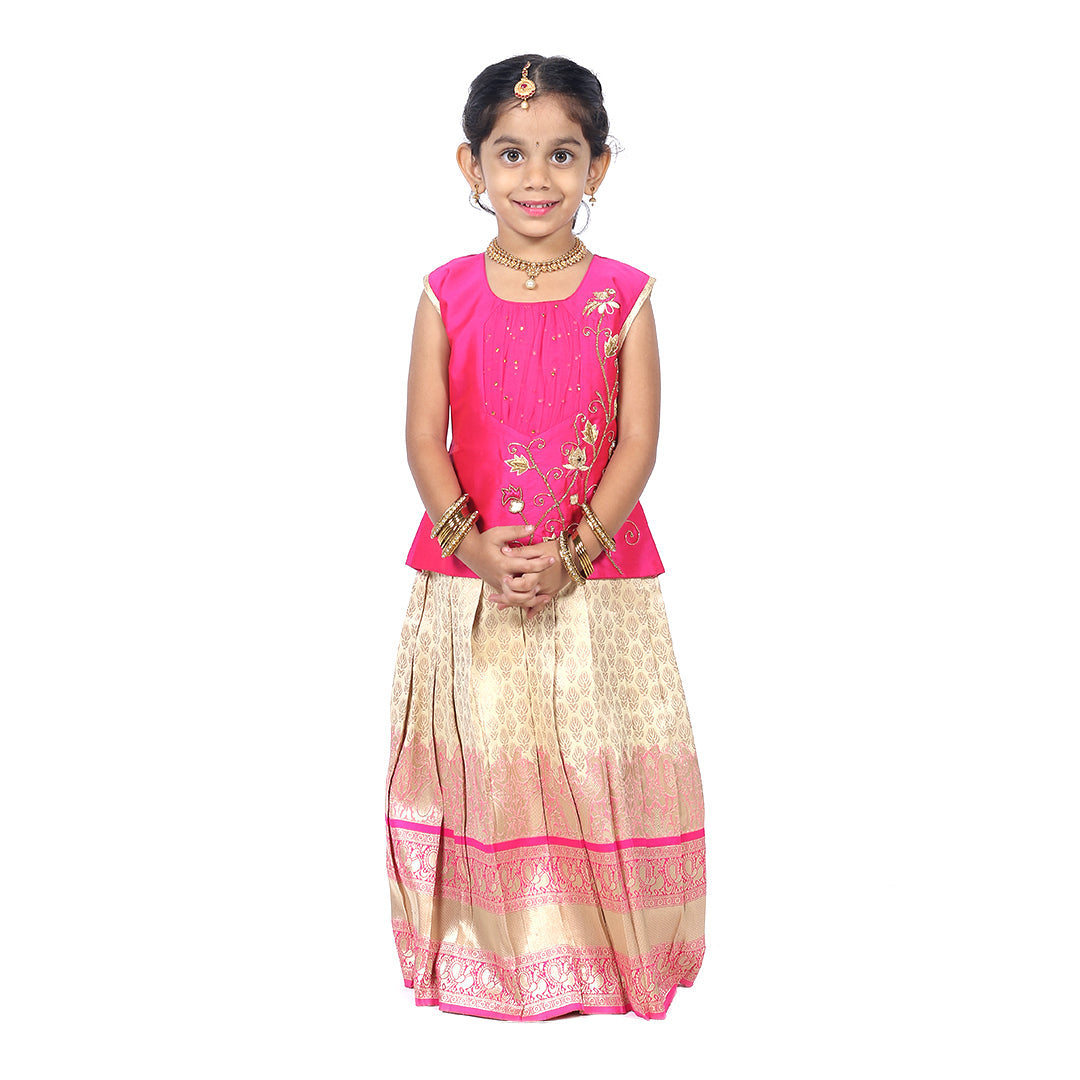 Pink color hand embroidered Pattupavadai set paired with sandal color skirt